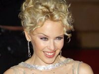 Kylie Minogue şi-a lansat un calendar sexy pentru anul 2009