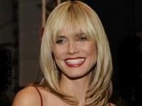 Heidi Klum promovează consumul de lapte printr-o campanie publicitară
