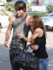 Miley Cyrus si Justin Gaston