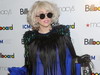 Lady Gaga a ales o rochie transparenta decorata cu pene si... par pentru a primi premiul Billboard! Iti place?
