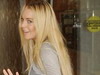 Fashion Fiasco! Lindsay Lohan a purtat dresuri rupte la petrecerea cu care lansa... o linie de colanti!