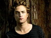 Robert Pattinson furios pe o admiratoare care l-a pupat, desi era bolnava de gripa porcina