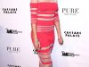 Rihanna tine la traditie: a purtat de Revelion o rochie rosie 