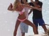 Candice Swanepoel, intr-un pictorial fierbinte, pe o plaja din St. Barts