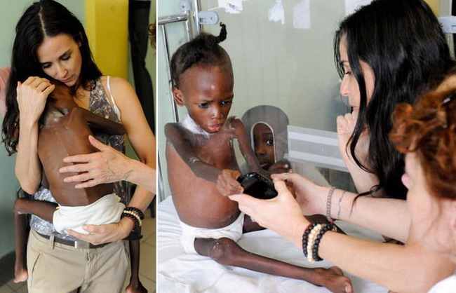 Demi Moore, in vizita la copiii orfani din Haiti
